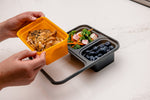 Removable entree section snapping out